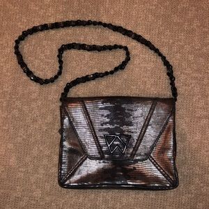 Kelly Wynne Cloud 9 Clutch Metallic Snakeskin